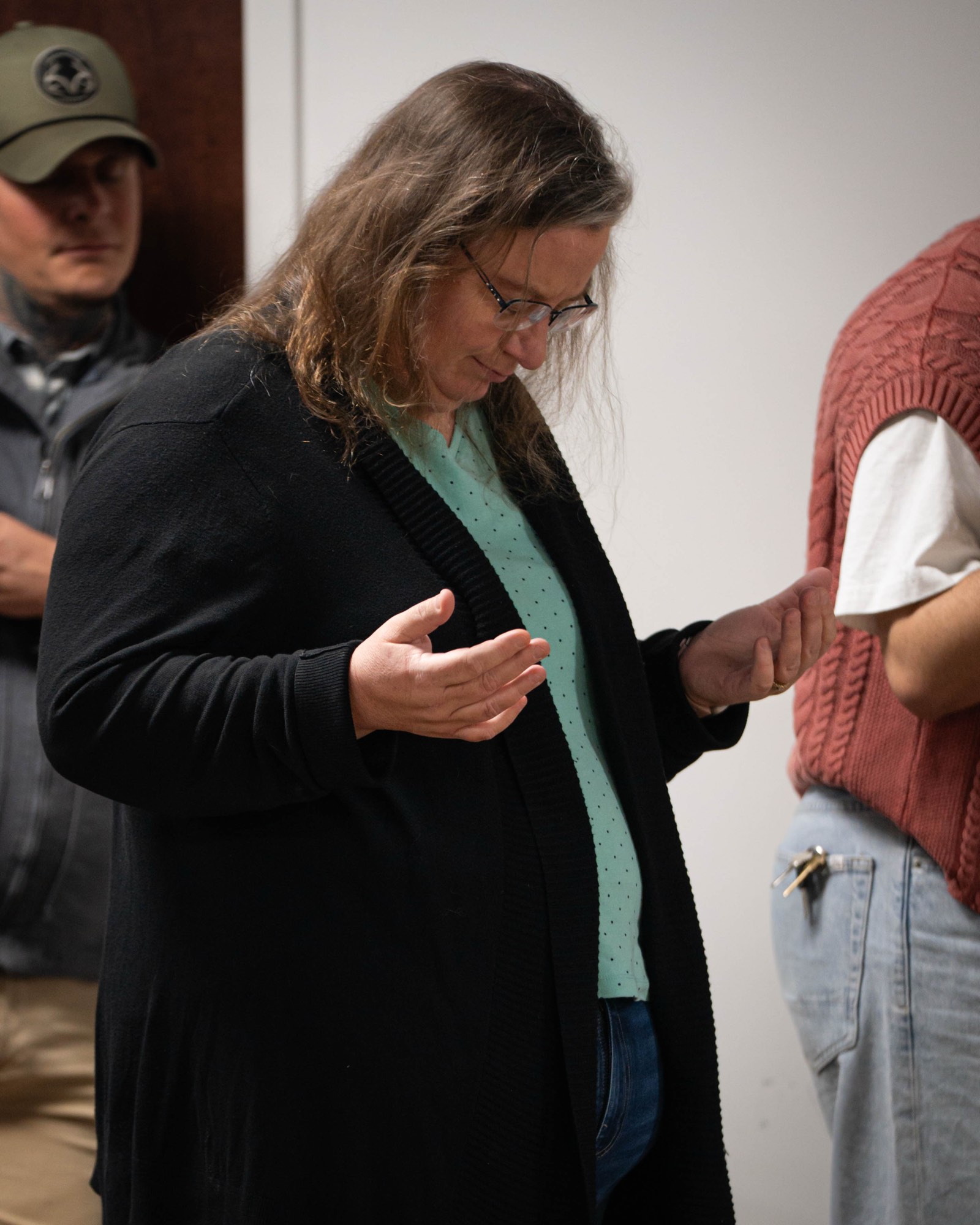 Victory Church member in prayer