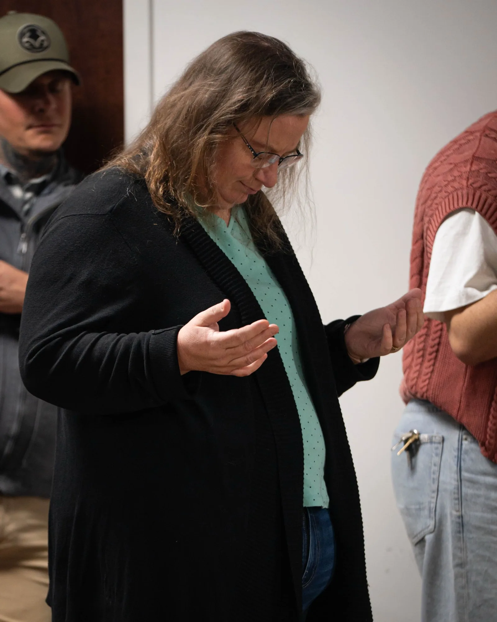 Victory Church member in prayer