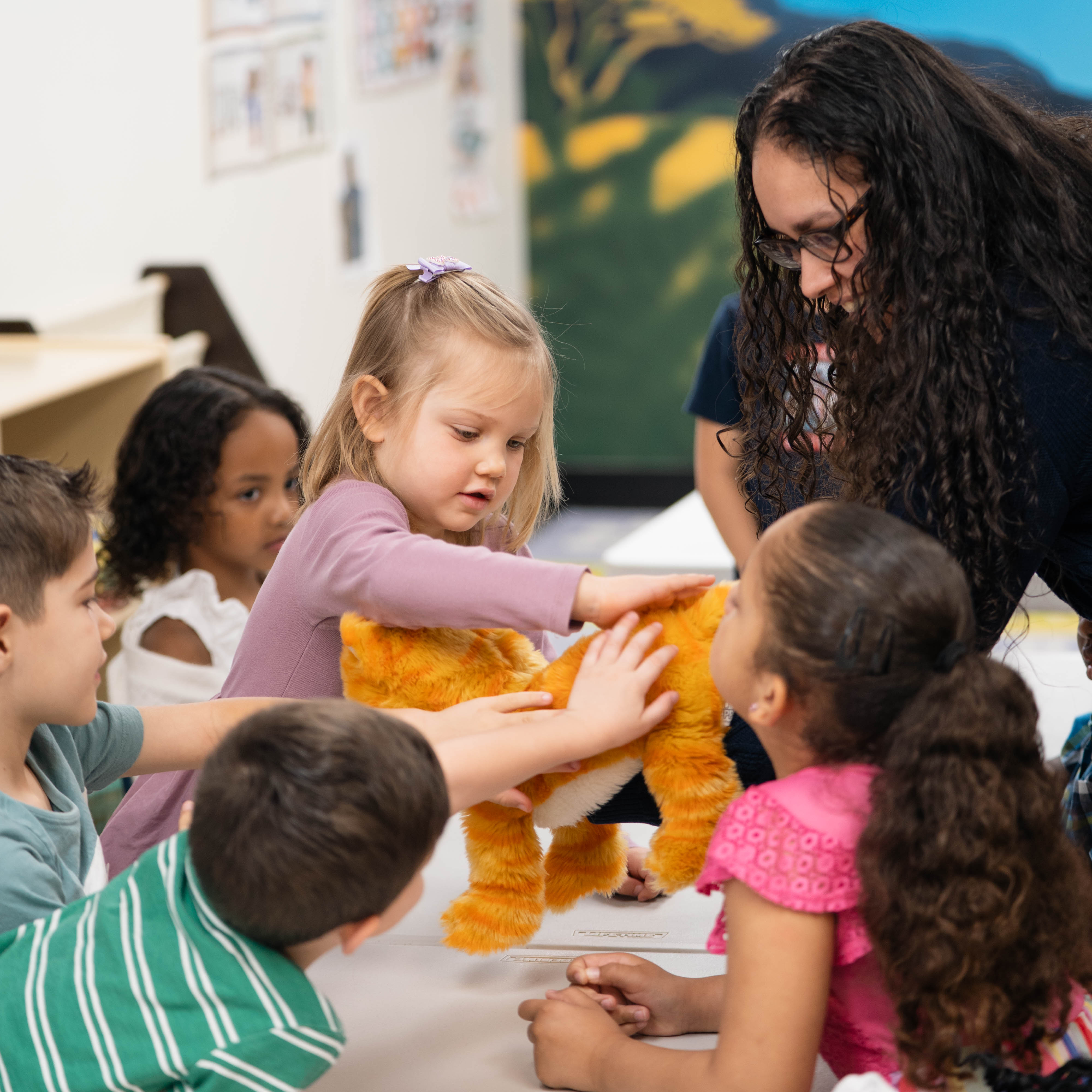 Kids enjoying Victory Kids classroom